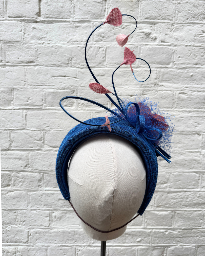 blue halo headpeice with silk abaca flowers and curled quils by isabella josie rear
