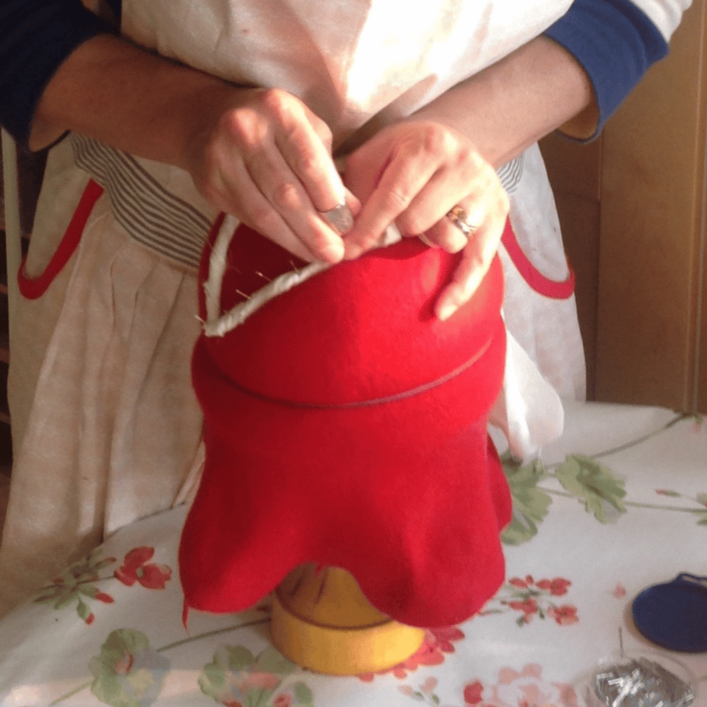 Isabella Josie blocking a hat